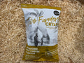 Two Founder's Crisps package on a straw background