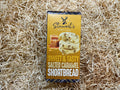 Box of Stewarts Scotland sweet and tasty salted caramel shortbread on a textured beige background