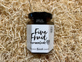 Jar of Five Fruit Marmalade on a bed of straw