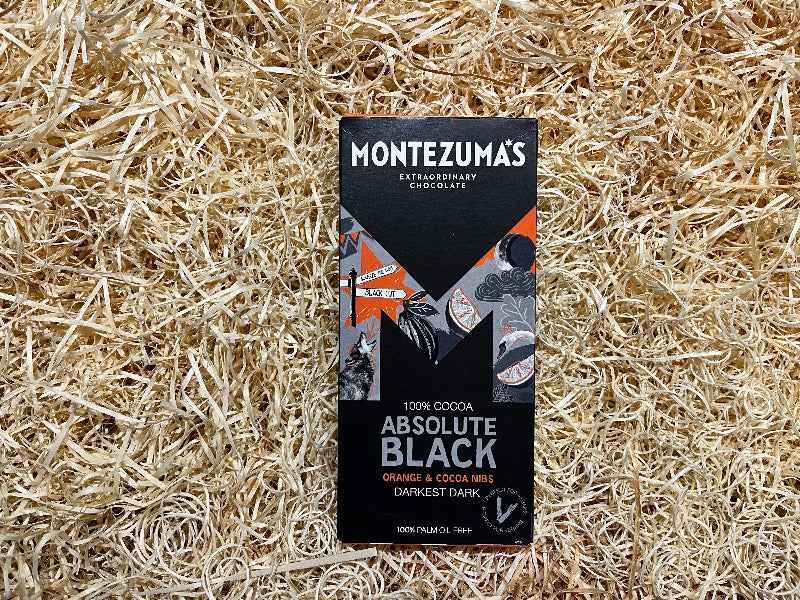 Montezuma's Absolute Black with Orange & Cocoa Nibs - The Courtyard Marketplace