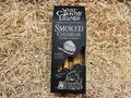 Packaged smoked cheddar cheese straws from West Country Legends on a straw background