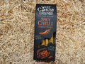 Box of West Country Legends Spicy Chilli Cheese Straws on a straw background