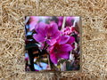 Card with purple flowers on a textured beige background